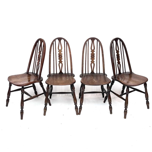 3015 - Set four beech and elm dining chairs, the spindle backs with central splats with carved roundels, so... 