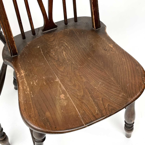 3015 - Set four beech and elm dining chairs, the spindle backs with central splats with carved roundels, so... 