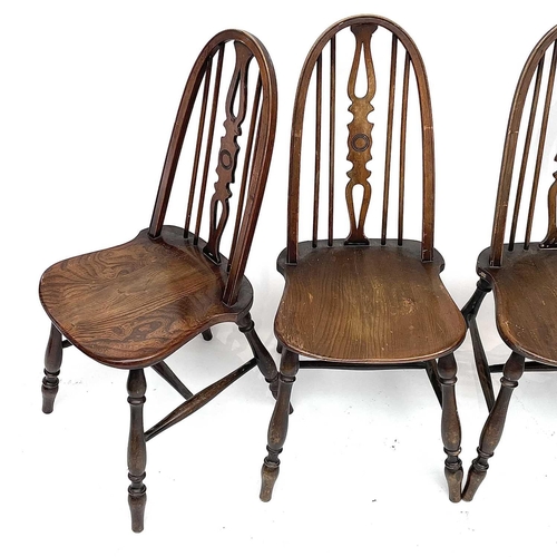 3015 - Set four beech and elm dining chairs, the spindle backs with central splats with carved roundels, so... 