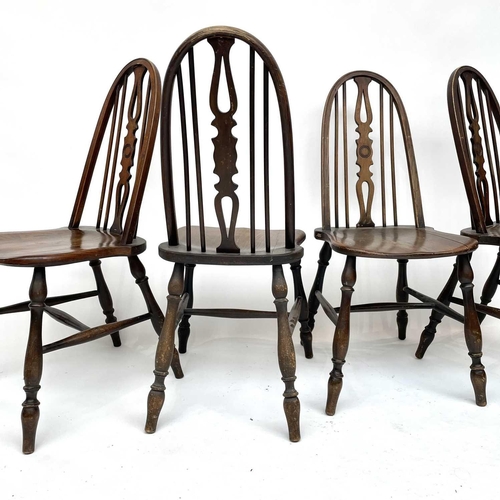 3015 - Set four beech and elm dining chairs, the spindle backs with central splats with carved roundels, so... 