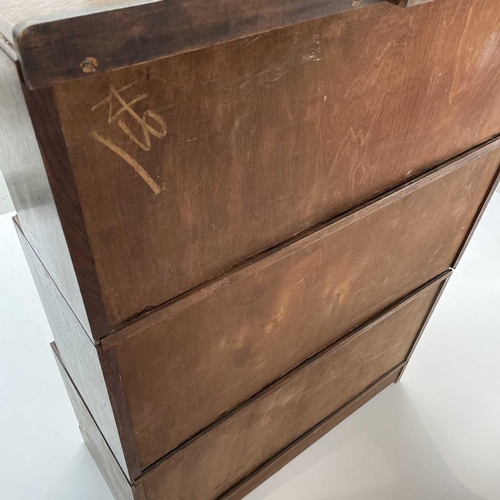 3019 - A pair of oak sectional bookcases, the 1930s, each with Odeonesque moulded frieze above two pairs of... 