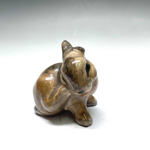 828 - A Beswick figure of a recumbent fowl, length 13cm, another standing, and two other figures (4).