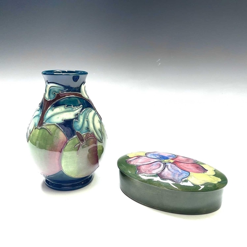 830 - A Moorcroft pottery vase Apples signed to base, height 14cm together with a Moorcroft pottery Clemat... 