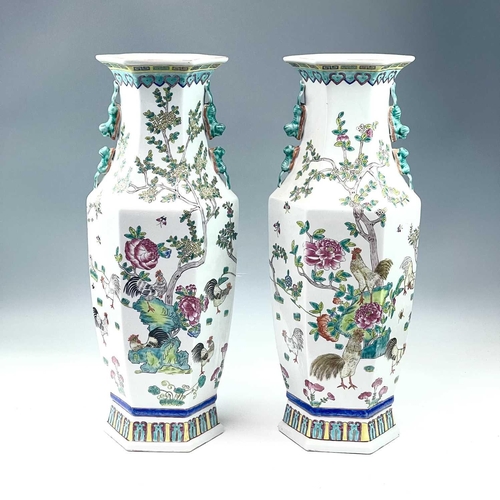 856 - A pair of late 20th century Chinese porcelain Famille rose hexagonal vases decorated with cockerels ... 