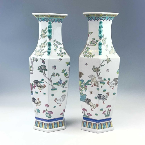 856 - A pair of late 20th century Chinese porcelain Famille rose hexagonal vases decorated with cockerels ... 