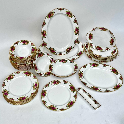 879 - A Royal Albert Old Country Roses part service comprising two large oval platters, smaller oval platt... 