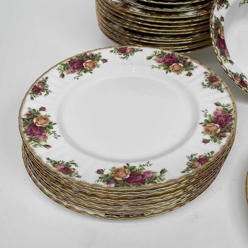 879 - A Royal Albert Old Country Roses part service comprising two large oval platters, smaller oval platt... 