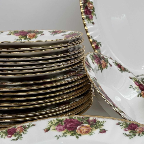 879 - A Royal Albert Old Country Roses part service comprising two large oval platters, smaller oval platt... 