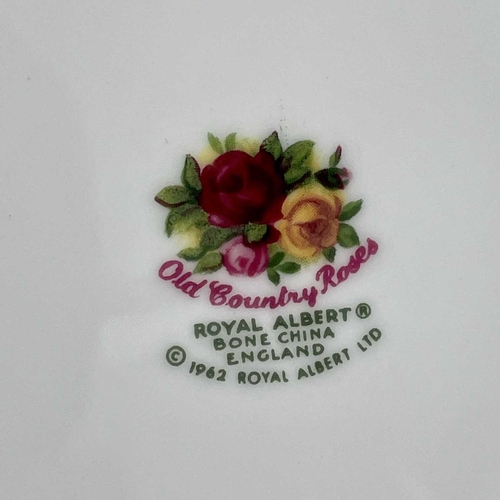 879 - A Royal Albert Old Country Roses part service comprising two large oval platters, smaller oval platt... 