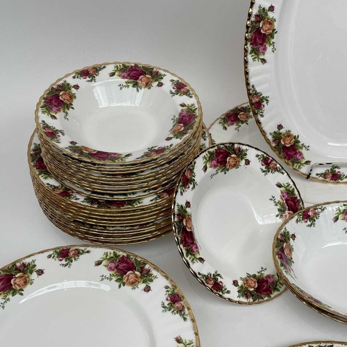 879 - A Royal Albert Old Country Roses part service comprising two large oval platters, smaller oval platt... 