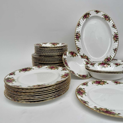 879 - A Royal Albert Old Country Roses part service comprising two large oval platters, smaller oval platt... 