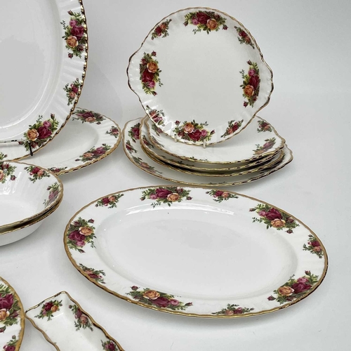 879 - A Royal Albert Old Country Roses part service comprising two large oval platters, smaller oval platt... 