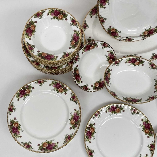 879 - A Royal Albert Old Country Roses part service comprising two large oval platters, smaller oval platt... 