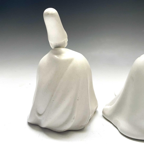 882 - Three Yildiz Imperial porcelain figures of Sufi Muslim musicians, height 13cm.