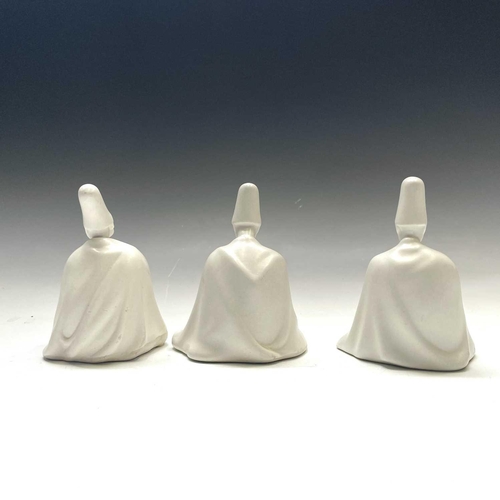 882 - Three Yildiz Imperial porcelain figures of Sufi Muslim musicians, height 13cm.