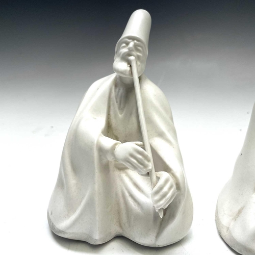882 - Three Yildiz Imperial porcelain figures of Sufi Muslim musicians, height 13cm.
