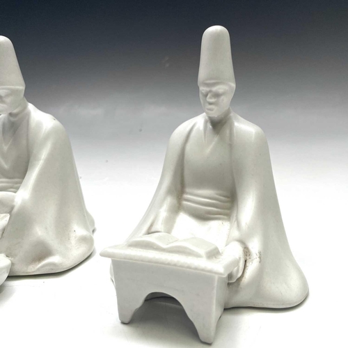 882 - Three Yildiz Imperial porcelain figures of Sufi Muslim musicians, height 13cm.