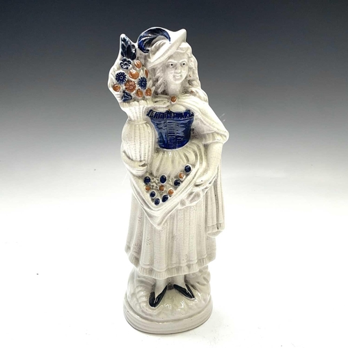 883 - A pair of Victorian Staffordshire flatback figures, of a young man and his companion, each beside a ... 