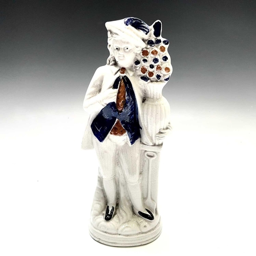 883 - A pair of Victorian Staffordshire flatback figures, of a young man and his companion, each beside a ... 