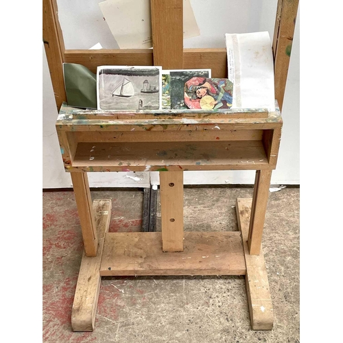 248 - Sven BERLIN (1911-1999) An easel and portfolio from Berlin's studio. The easel has numerous postcard... 