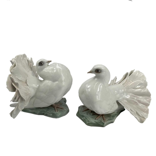 866 - A pair of 20th century Rosenthal porcelain doves impressed F. Heidenreich to base, height 14cm.