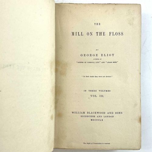 32 - GEORGE ELIOT. 'The Mill on the Floss,' three vols, original cloth with library subscription label to... 