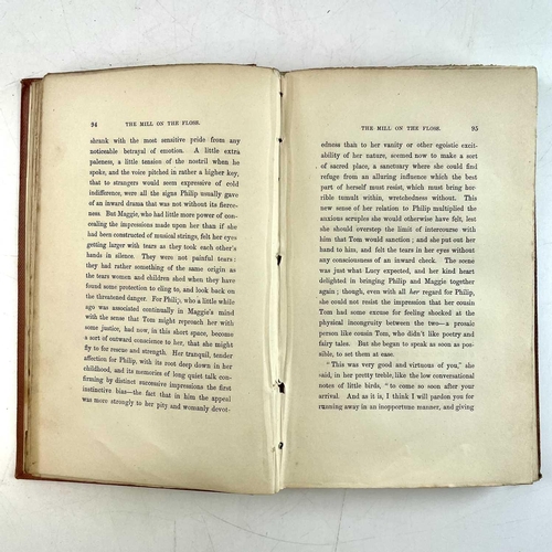 32 - GEORGE ELIOT. 'The Mill on the Floss,' three vols, original cloth with library subscription label to... 