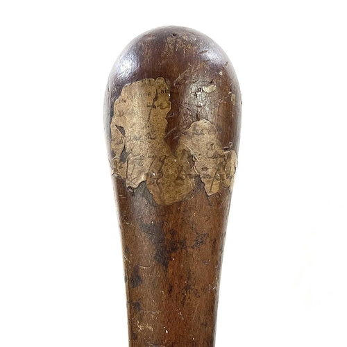 1 - A 19th century hardwood knobkerrie of typical form, with remnants of handwritten note attached and d... 