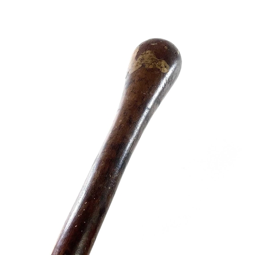 1 - A 19th century hardwood knobkerrie of typical form, with remnants of handwritten note attached and d... 