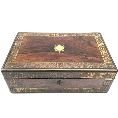 101 - A William IV rosewood and brass inlaid writing slope, with fitted interior including secret drawers ... 