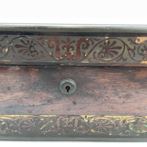 101 - A William IV rosewood and brass inlaid writing slope, with fitted interior including secret drawers ... 