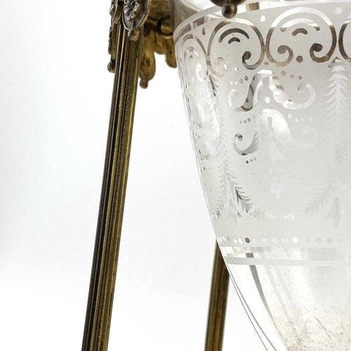 102 - A Victorian etched glass amphora shape vase, with twin handles, contained in a gilt brass stand with... 