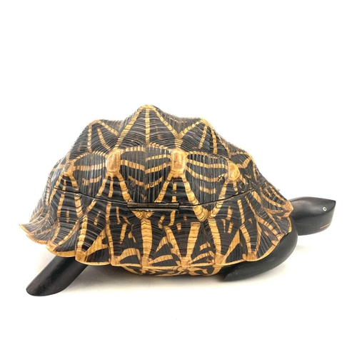 11 - An Anglo-Indian turtle form trinket box, early 20th century, with star tortoiseshell cover and inlai... 