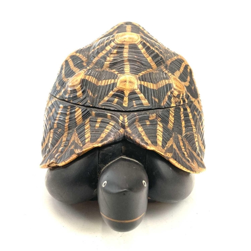 11 - An Anglo-Indian turtle form trinket box, early 20th century, with star tortoiseshell cover and inlai... 