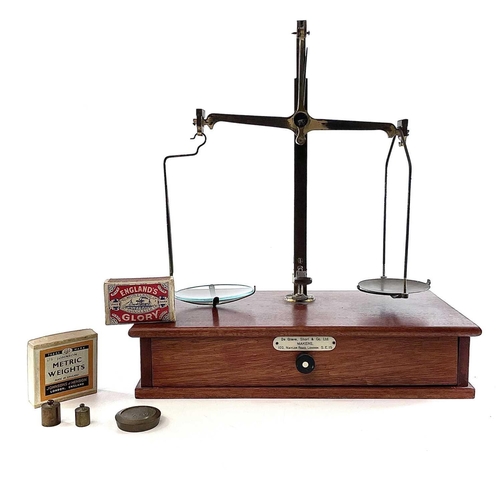 115 - A set of mahogany and brass precision scales, by De Grave, Short & Co Ltd, with a few weights contai... 