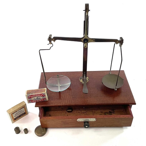 115 - A set of mahogany and brass precision scales, by De Grave, Short & Co Ltd, with a few weights contai... 