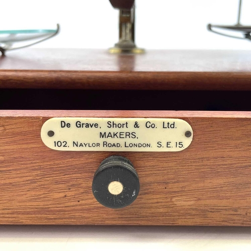 115 - A set of mahogany and brass precision scales, by De Grave, Short & Co Ltd, with a few weights contai... 