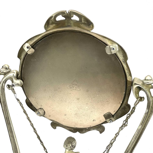 122 - An Art Nouveau style silver plated swing mirror, stamped Erte, Paris, modelled with a lady on a swin... 