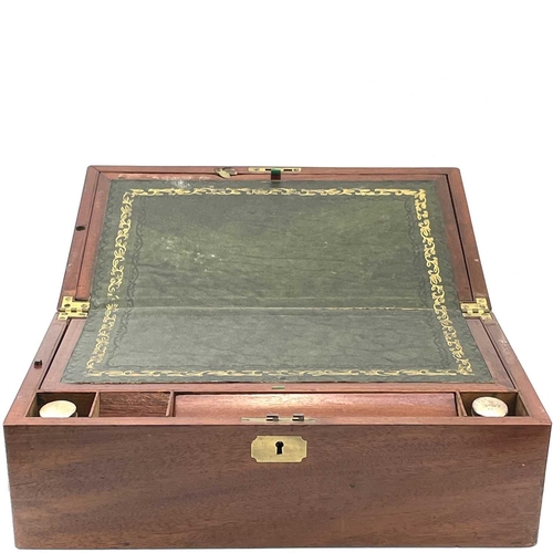 125 - A mahogany writing box, mid 19th century, with fitted interior and a side drawer, width 40.5cm.