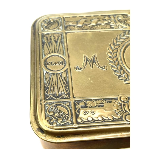 127 - A WW I brass Princess Mary 1914 Christmas tin together with another similar. 13cm x 8.5cm. (2)