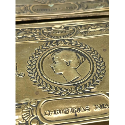 127 - A WW I brass Princess Mary 1914 Christmas tin together with another similar. 13cm x 8.5cm. (2)