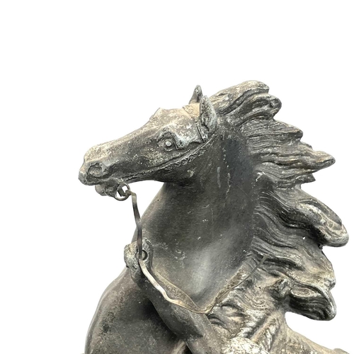 132 - A pair of spelter Marly horses, French, circa 1900, raised on slate plinth bases with applied bronze... 