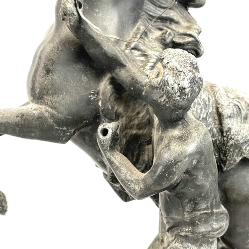 132 - A pair of spelter Marly horses, French, circa 1900, raised on slate plinth bases with applied bronze... 