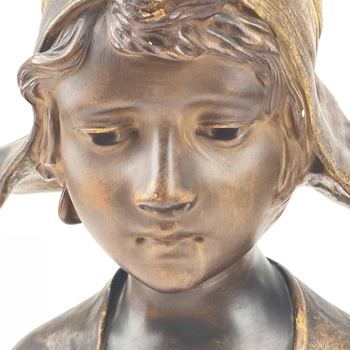 136 - An Art Nouveau plaster bust, of a Dutch girl, signed Paul Nelson, height 41cm.