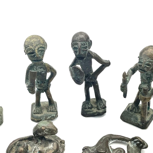 138 - Eight Ashanti bronze small figures, late 19th/early 20th century, the largest height 6cm, together w... 