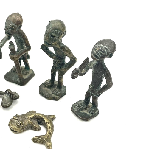 138 - Eight Ashanti bronze small figures, late 19th/early 20th century, the largest height 6cm, together w... 