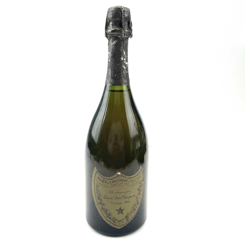 143 - A bottle of Moet Chandon Cuvee Dom Perigion 1980 vintage champagne.