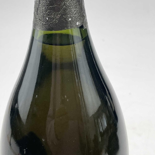 143 - A bottle of Moet Chandon Cuvee Dom Perigion 1980 vintage champagne.