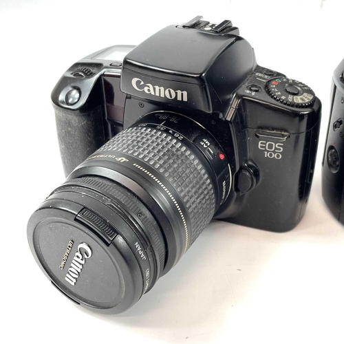 148 - A Canon EOS 1000F SLR camera serial number 3336289 fitted with Canon Zoom Lens EF 35-80mm lens toget... 