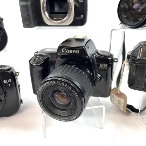 148 - A Canon EOS 1000F SLR camera serial number 3336289 fitted with Canon Zoom Lens EF 35-80mm lens toget... 